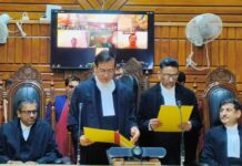 Chief Justice administers oath of office to Justice Mohd Yousuf Wani