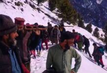Locals Carry Pregnant Woman On Shoulders Amid Road Closure In North Kashmir Locals carry patient for kilometers to reach hospital in north Kashmir’s Kupwara district on March 05 2024 (snapshot of viral video).