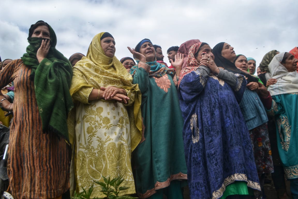 A group of women are wailing near the spot where a boat carrying 19 people, including minors, capsized. This tragic incident in the Batwara area of Central Kashmir's Srinagar district on April 16, 2024, has resulted in six deaths, with three others still missing. (KL images: Sahil Mir)