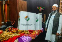 A man who was paralyzed in an accident in 2014 cast his vote via secret ballot in Doda district on April 14, 2024, participating in the Parliament elections. (KL image: Amir Tantray)