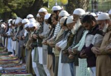 People gathered to offer Eid-ul-Fitr prayers at Eid Gah in the main town of Bandipora district in north Kashmir on Wednesday, April 10, 2024. (KL-image Majid Raina)