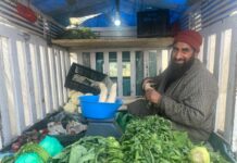 Irshad-Ahmad-Sheikh-Selling-Vegetables-on-a-Load-carrier