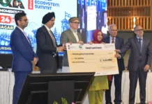 Omar Abdullah Launches Jammu Kashmir’s Biggest Startup Summit, Urges Youth to Become Job Creators Chief Minister Omar Abdullah giving a cheque to a start up under Seed Development Fund