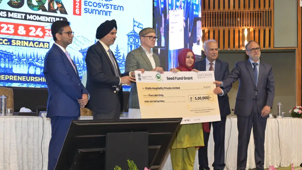 Chief Minister Omar Abdullah giving a cheque to a start up under Seed Development Fund