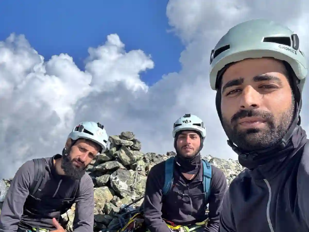 Kashmiri mountaineers Yasir Khan, Muzakir Khan and Saqib Shafi at the summit of Bram Sakli Peak after opening the Baghiyar Route on the mountain's eastern face, marking the third documented ascent of the 4,730-metre peak