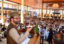Mirwaiz Pays Tributes to Ayatollah Khamenei at Budgam Memorial, Calls for Muslim Unity Mirwaiz-e-Kashmir Dr Moulvi Mohammad Umar Farooq addresses a memorial event organised by Anjuman-e-Sharie Shian in Budgam on July 9,2026