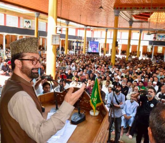 Mirwaiz Pays Tributes to Ayatollah Khamenei at Budgam Memorial, Calls for Muslim Unity Mirwaiz-e-Kashmir Dr Moulvi Mohammad Umar Farooq addresses a memorial event organised by Anjuman-e-Sharie Shian in Budgam on July 9,2026