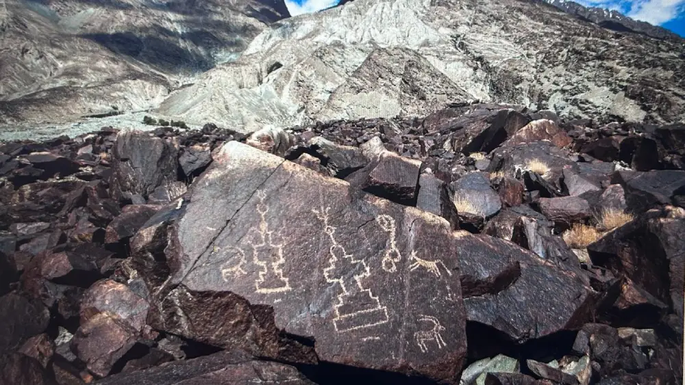Murgi, a remote village in Ladakh's Nubra Valley, is home to Murgi Tokpo, the region's largest prehistoric rock art site, where more than 3,000 ancient petroglyphs are etched into the landscape. The village is also known for the historic Ensa Gompa and a secluded waterfall, making it one of Ladakh's most remarkable yet lesser-known heritage destinations.