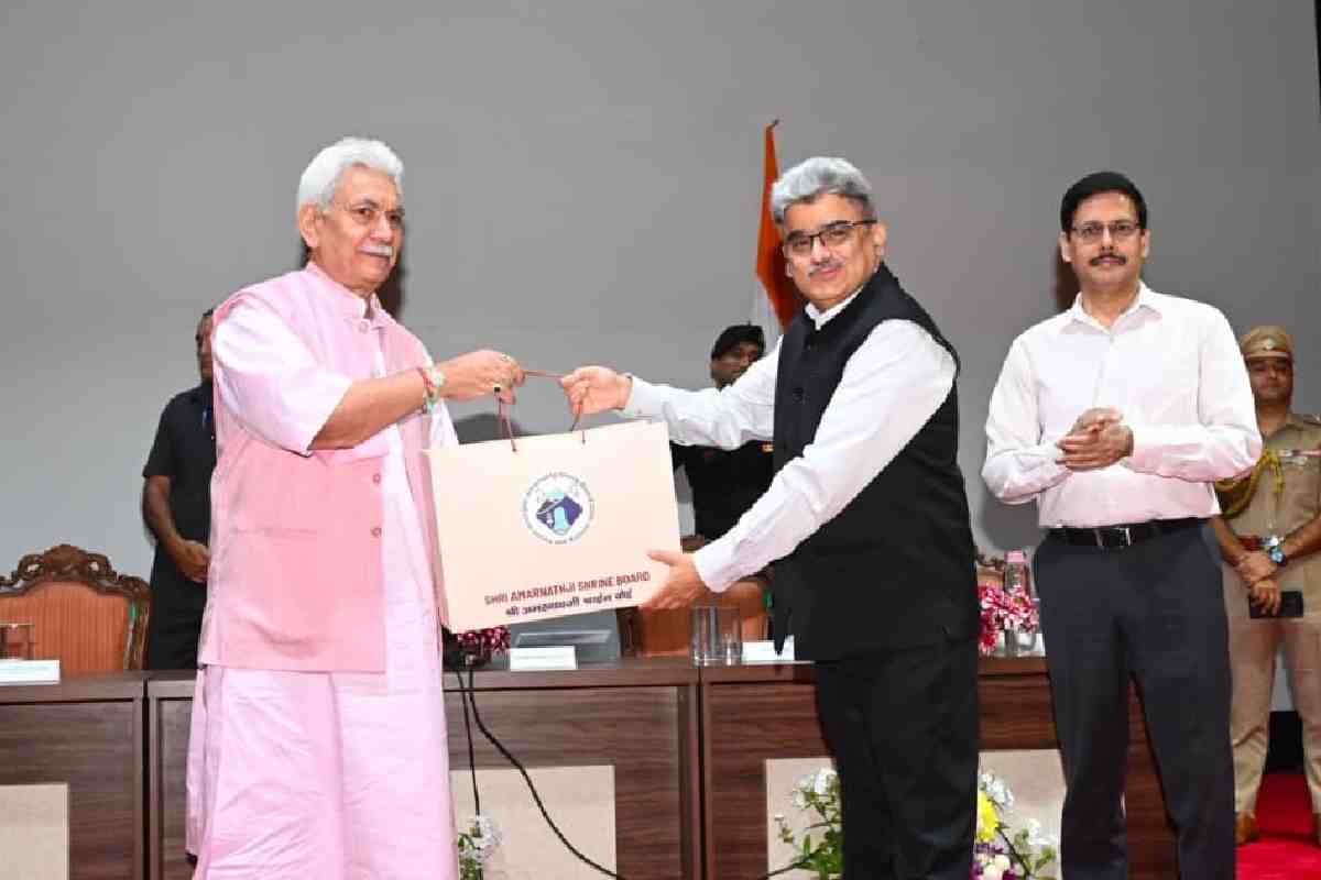 Lieutenant Governor Manoj Sinha felicitates Chief Secretary Atal Dulloo for his contribution to the successful conduct of Shri Amarnath Ji Yatra-2026, in Srinagar on August 30,2026