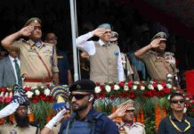 CM Omar Abdullah unfurls the Tricolor during August 15 function at Bakshi Stadium, in Srinagar, Saturday, August 15, 2026. KL Image by Bilal Bahadur