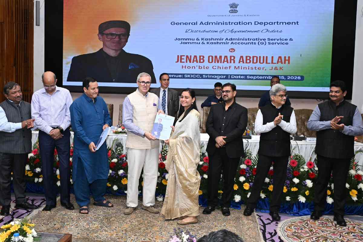 Chief Minister Omar Abdullah hands over an appointment order to a newly appointed officer during a function at SKICC in Srinagar on September 15, 2026.