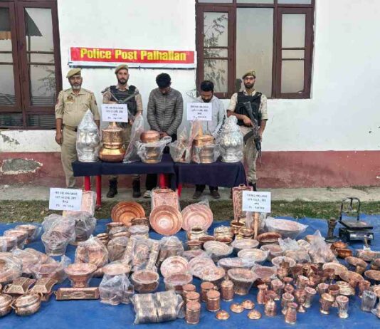 Police display the copper utensils recovered during the investigation into a theft case registered at Pattan in Baramulla